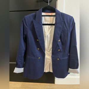 Navy blue blazer with gold buttons